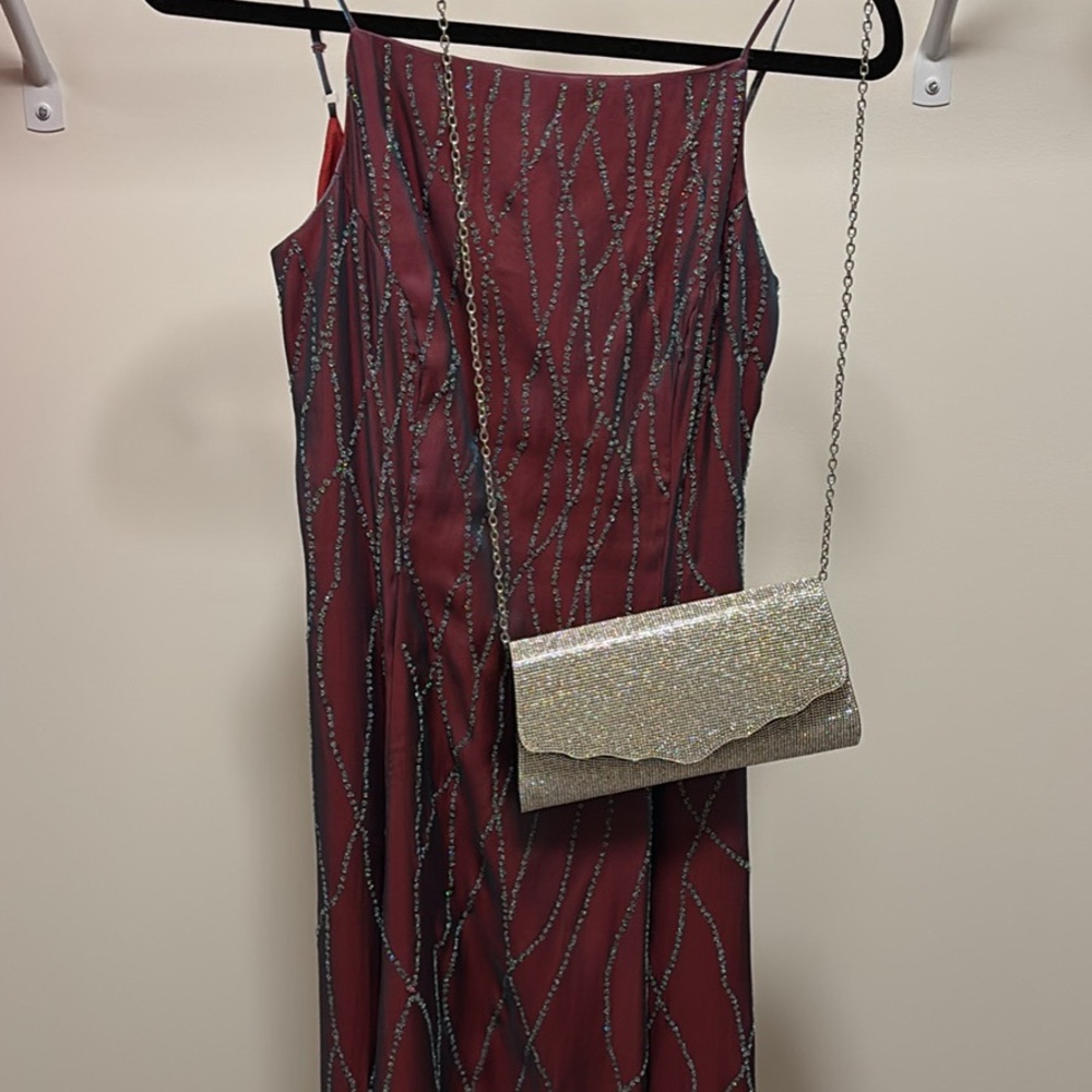 Elegant Red Dress with Silver Clutch